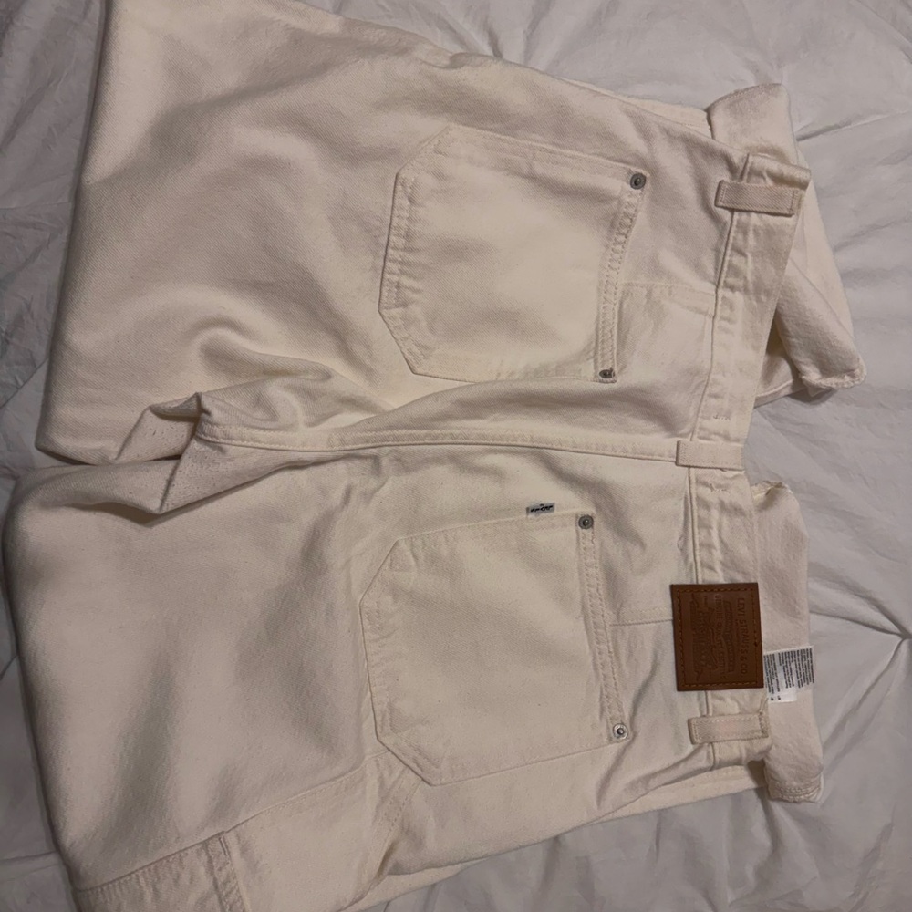Levi’s White Pants.